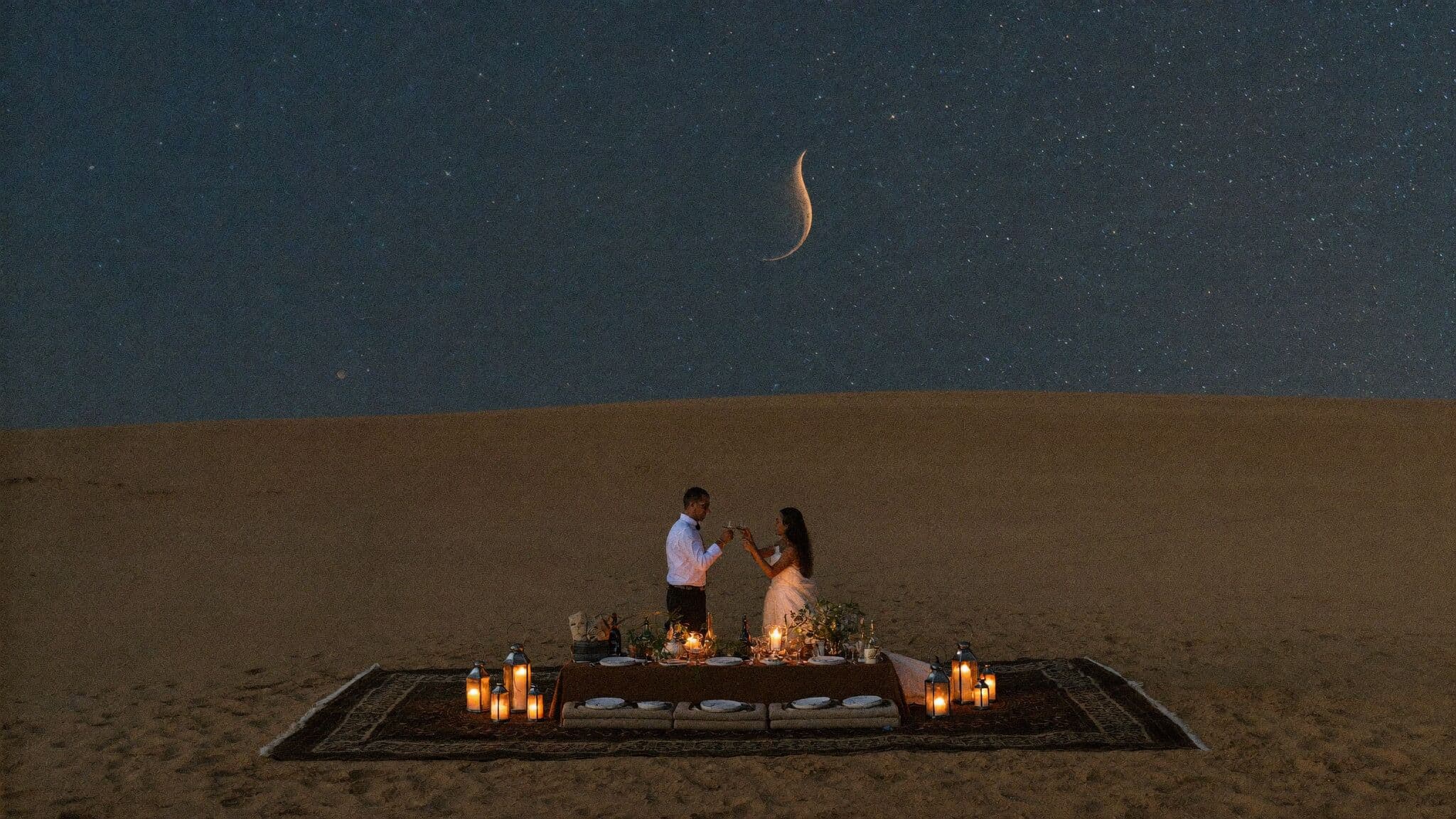 Newlyweds outside a lantern-lit desert camp under the Milky Way, Morocco elopement