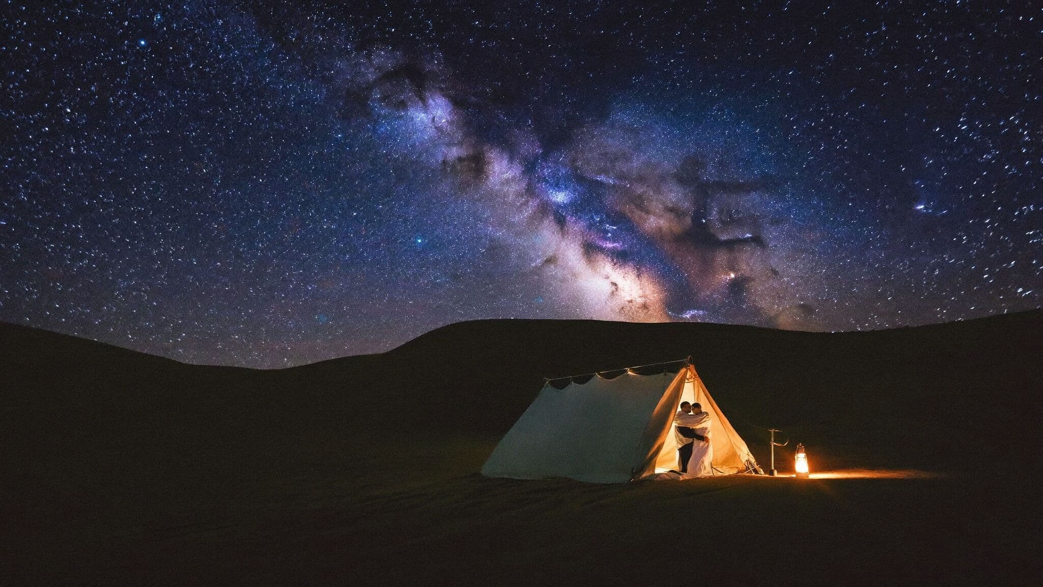 Newlyweds under the Milky Way in the NamibRand dark-sky reserve, Namibia elopement